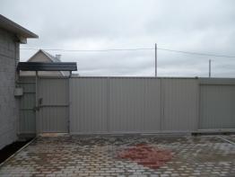 Откатные ворота с калиткой и электроприводом обшитые профлистом в Иваново